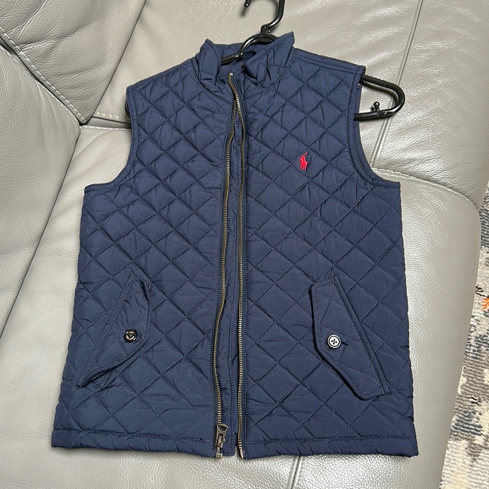 Gently used Size 7 quilted Navy Blue vest.